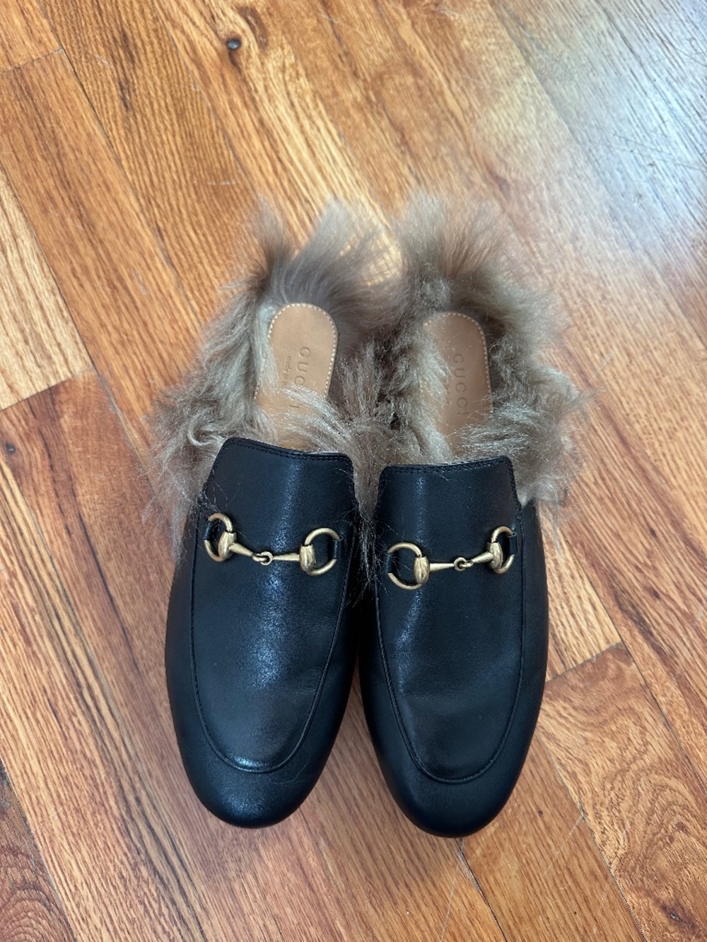 Gucci fur lined mule slides